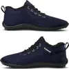 Two views of a pair of navy blue shoes with black soles and black fur lining. Produktbild-Vorschau