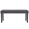 A studio shot of a gray upholstered bench with black legs against a white background. Náhled obrázku produktu