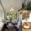 A collage of images showing a hanging lantern light fixture on a porch, close-ups of the fixture's details, and a porch setting with furniture. Voir les images du produit