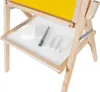 A close-up view of a child's easel with a yellow board and a tray holding chalk, a marker, and an eraser. Podgląd zdjęcia produktu