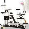 A multi-level cat tree with various platforms, scratching posts, and a hammock, featuring two cats and a toy mouse. Náhled obrázku produktu