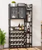 A multi-tiered black wine rack with glass doors, holding bottles of wine, glasses, and decorative items. Anteprima dell’immagine prodotto