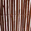 A close-up view of a woven fence made of thin, dark brown branches. Produktbild-Vorschau