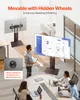 A modern office or meeting room setting with people interacting around a table and a large TV on a stand. Produktbild-Vorschau