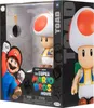 The image shows a boxed action figure of Toad from The Super Mario Bros. Movie. Anteprima dell’immagine prodotto