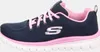 A side view of a navy and pink Skechers sneaker. Voir les images du produit