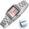 A silver Casio watch with a pink face is shown against a white background. A small Casio box is placed to the right of the watch. Produktbild-Vorschau