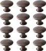 A set of 12 vintage-style cabinet knobs in a red-bronze finish, arranged in a grid. Produktbild-Vorschau