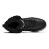 A top-down view of a black Puma sneaker with white soles and black laces. The sneaker has a furry lining. Produktbild-Vorschau
