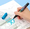 A hand holding a marker and coloring a picture. Náhľad obrázku produktu