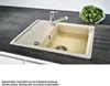 A kitchen sink with a faucet and a bunch of lettuce on a countertop. Produktbild-Vorschau