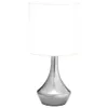 A table lamp with a silver base and a white lampshade, presented against a white background. Náhľad obrázku produktu