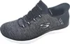 A side view of a single black and gray Skechers shoe. Podgląd zdjęcia produktu