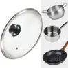 A collage of kitchenware items including a glass lid, a small pot, a saucepan, and a frying pan. Voir les images du produit