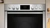 A close-up view of the control panel and upper part of a built-in oven. Produktbild-Vorschau