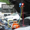 A person is using a vacuum pump and manifold gauge set on a car engine. Anteprima dell’immagine prodotto