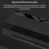 A close-up view of a phone case with a carbon fiber texture and a glossy black sheet. Anteprima dell’immagine prodotto