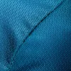 A close-up view of blue fabric with a geometric pattern. Náhled obrázku produktu