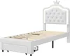 A white upholstered twin bed frame with a tufted headboard featuring LED lighting and a crown accent. Voir les images du produit
