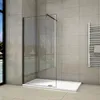 A modern bathroom with a walk-in shower, tiled walls, and a heated towel rack. Produktbild-Vorschau