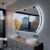A modern bathroom with a large, illuminated mirror reflecting a city skyline. Produktbild-Vorschau