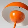 A close-up view of the underside of an orange mushroom-shaped lamp. Podgląd zdjęcia produktu
