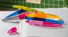 Several colorful pens are arranged on an open notebook with handwritten text. Anteprima dell’immagine prodotto