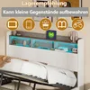 A bed with a headboard featuring integrated storage and LED lighting. Produktbild-Vorschau