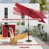 An outdoor patio scene with a red umbrella, chairs, and plants. Anteprima dell’immagine prodotto