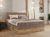 A bedroom scene featuring a large boxspring bed. Produktbild-Vorschau