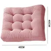 A pink, tufted seat cushion is shown from a slightly elevated angle against a white background. Dimensions are indicated by text overlays. Produktbild-Vorschau