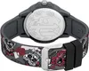 Close-up view of the back of a watch with a skull and rose pattern on the strap. Podgląd zdjęcia produktu