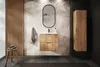 A modern bathroom vanity with wooden accents and a tropical-themed wallpaper. Produktbild-Vorschau
