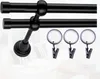 A double curtain rod with three curtain rings with clips. Produktbild-Vorschau
