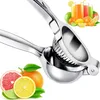 A manual citrus juicer is shown with various citrus fruits and glasses of juice in the background. Náhľad obrázku produktu
