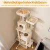 A tall, multi-level cat tree with a cat resting on the top perch, set in a room with a light-colored wall and wooden floor. Anteprima dell’immagine prodotto