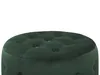A close-up view of a round, dark green, tufted ottoman. Náhled obrázku produktu