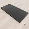 A black shower tray is shown on a light-colored wooden floor. Produktbild-Vorschau