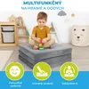 A young boy is playing with building blocks on a folded gray mat in a child's room. Náhľad obrázku produktu