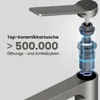 A close-up, cutaway view of a faucet's internal mechanism, highlighting its ceramic cartridge. Voir les images du produit