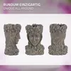 Three views of a bronze-colored planter shaped like a woman's head, adorned with flowers. Náhled obrázku produktu
