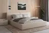 A bedroom scene featuring a bed, nightstand, and artwork. Produktbild-Vorschau