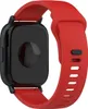 A close-up, angled view of the back of a smartwatch with a red silicone strap. Produktbild-Vorschau
