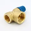 A brass plumbing valve with a blue cap, isolated on a white background. Náhľad obrázku produktu