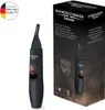 A product shot of a black nose and ear trimmer next to its packaging. Podgląd zdjęcia produktu