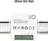 A white electrical device mounted on a metal DIN rail. Náhled obrázku produktu