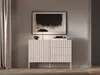 A modern living room with a light beige sideboard, a black lamp, and abstract art. Produktbild-Vorschau