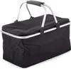 A black insulated picnic basket with silver handles and trim, shown from a slight angle against a white background. Náhled obrázku produktu