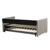 A light gray upholstered daybed with a slatted mattress base is shown from a side-angle against a white background. Anteprima dell’immagine prodotto