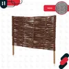 A woven willow fence panel with wooden stakes, presented on a white background with subtle watermark graphics. Anteprima dell’immagine prodotto